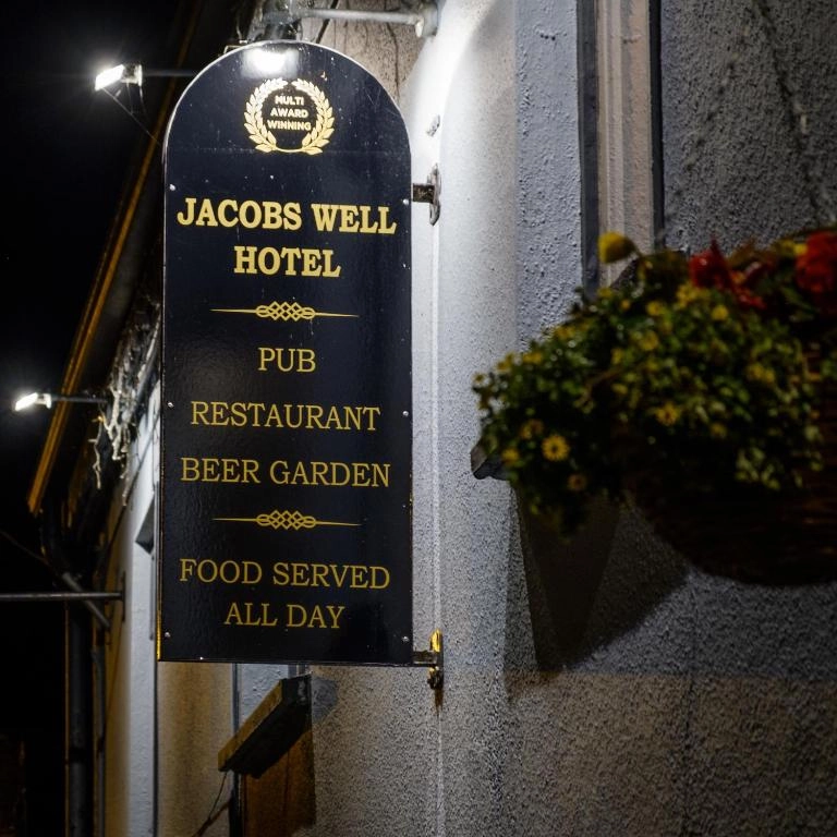 Jacob's Well Hotel sign in Rathdrum